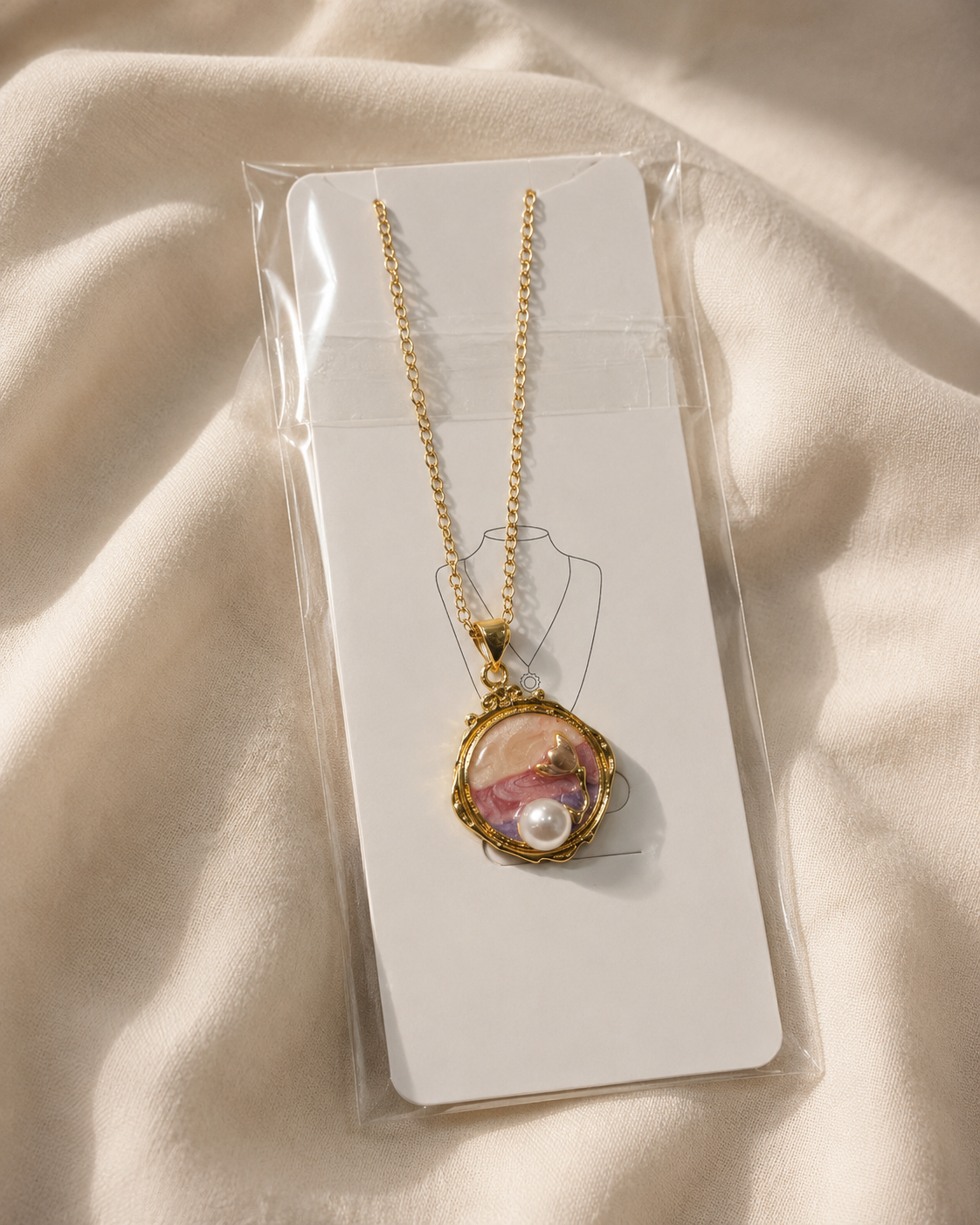 Zinmeerjewells gold pendant featuring a unique pinterest style pendant with a peach enamel sunset design and pearl, highlighting premium anti tarnish jewelry Pakistan.