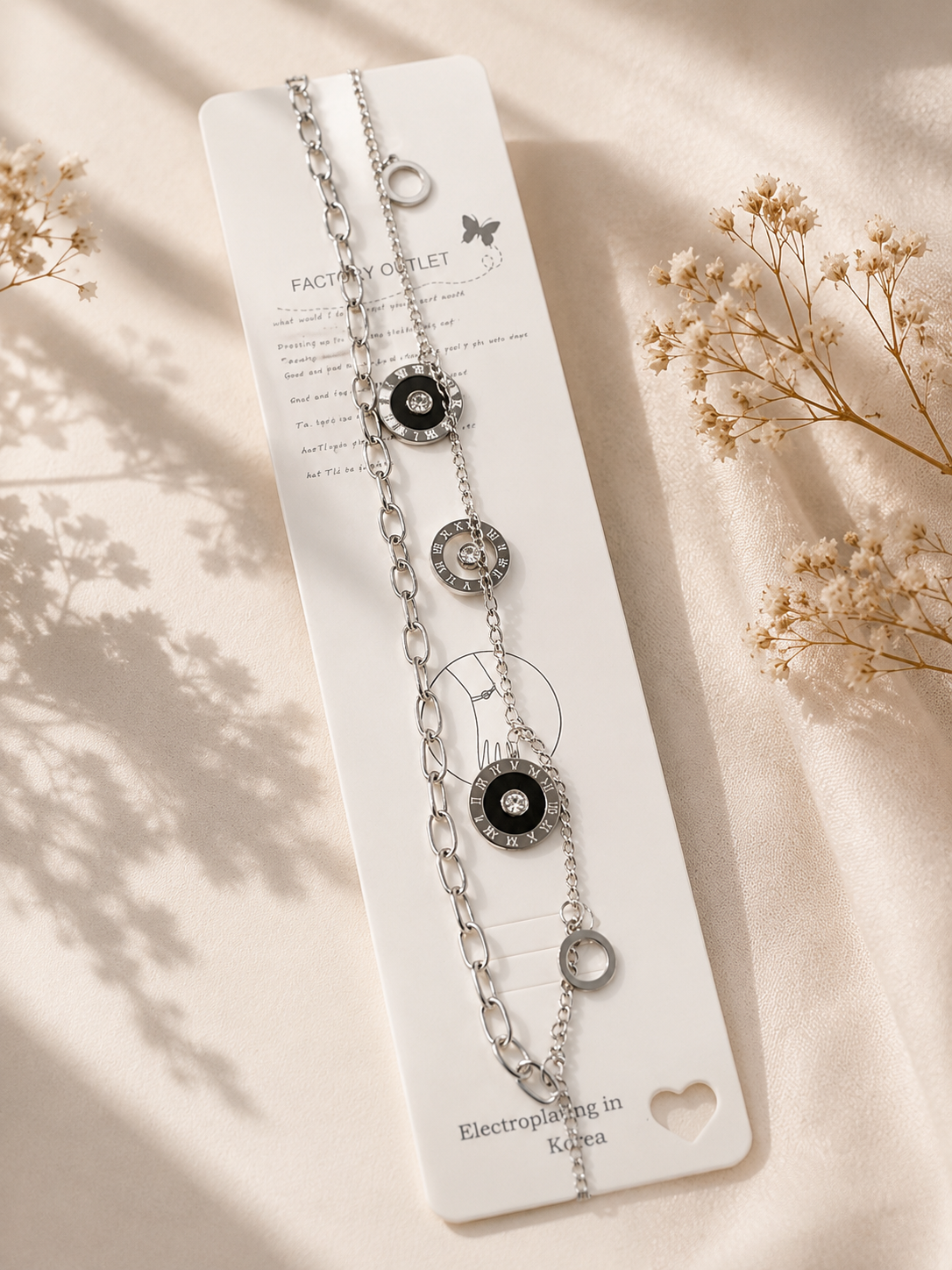 Zinmeerjewells double-layered silver bracelet for women featuring a Roman numeral bracelet charm design, highlighting anti tarnish jewelry Pakistan.