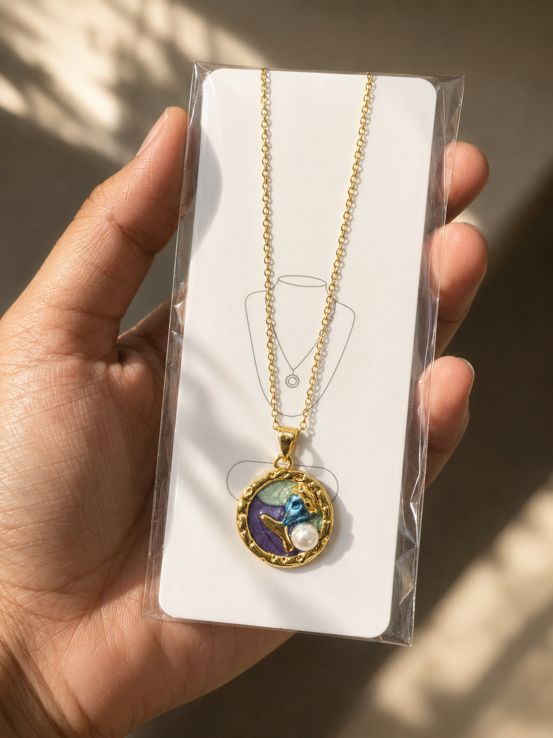 Zinmeerjewells gold pendant featuring a unique pinterest style pendant with a mermaid tail, highlighting premium anti tarnish jewelry Pakistan.