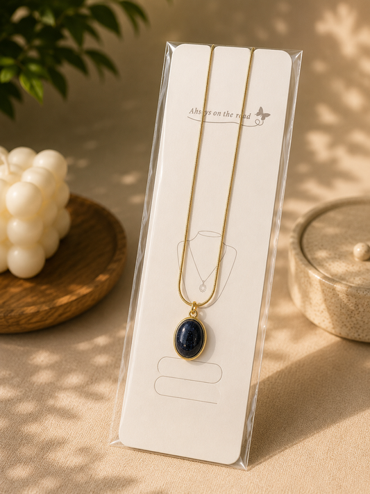 Zinmeerjewells gold chain necklace featuring an oval black stone necklace pendant design with a starry night look, showcasing premium anti tarnish jewelry Pakistan.